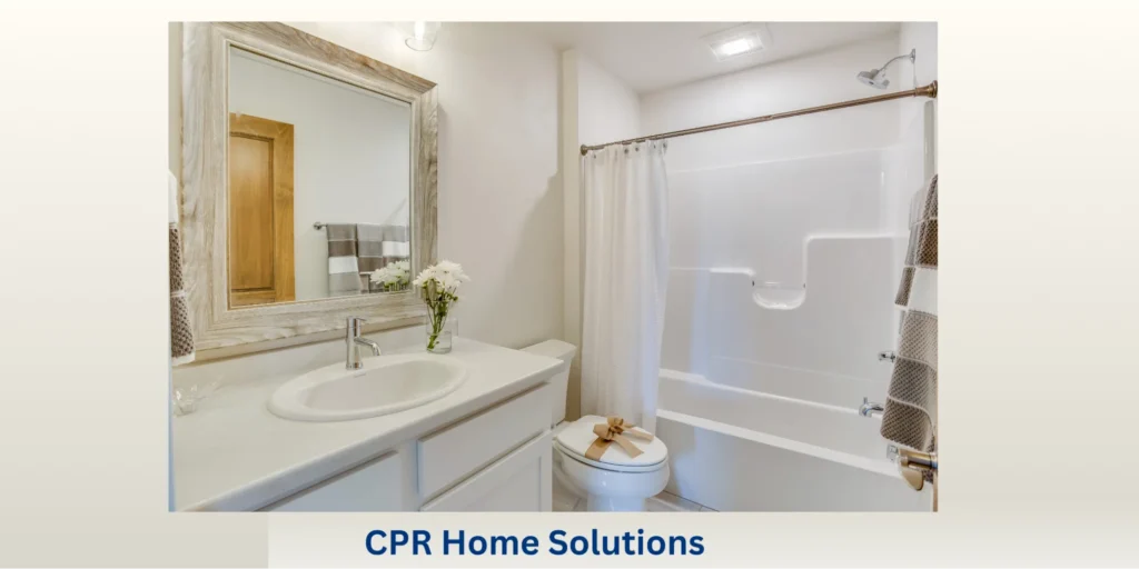 Simple, small bathroom design ideas with a compact bathtub, large framed mirror, and neutral tones create a bright and functional space